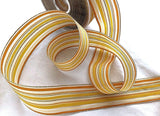 Yellow and metallic gold solid and sheer striped ribbon, 4cm in width.