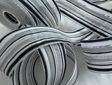 black, white, grey and metallic silver solid and sheer striped ribbon, 4cm in width.