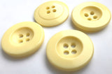 B5349 20mm Primrose Yellow 4 Hole Button with a Dinked Centre
