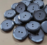 23mm grey iced matt & pearlised polyester 2 hole button. Sold individually, buy the exact quantity of buttons required at Ribbonmoon online haberdashery. Quantity discounts.