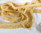 35mm Lampshade and soft furnishing trimming. Pale gold fringe trim with a cream in the corded braid. Ribbonmoon trims online shop.