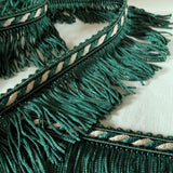 50mm Lampshade and soft furnishing trimming. Dark green fringe trim with a cream pearl in the corded braid. Ribbonmoon trims online shop.