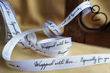 R0545 16mm White Grosgrain Ribbon-Wrapped with love Print, Berisfords