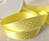 Lemon 1.5cm wide satin ribbon with a white spotty polka micro dot print.