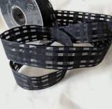 2.5cm black grosgrain and sheer check ribbon. Buy by the metre and cut to order. Order online with Ribbonmoon ribbons.