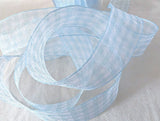 Pale blue and white sheer nylon traditional gingham ribbon. 25mm width.