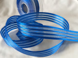 25mm width royal blue satin, sheer and thin metallic gold striped ribbon. Buy per metre, cut to length. Ribbonmoon huge online Berisfords Ribbons range.