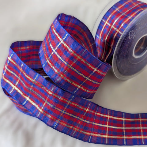 40mm wide wire edge tartan ribbon. Purple, red , blue with thin gold metallic stripes. UK made and cut and sold by the metre. Ribbonmoon ribbons online shop.