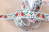 A 25mm wide white rustic taffeta ribbon featuring a charming Christmas robin theme print.