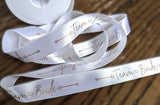 R9767 25mm White Satin Ribbon Team Bride Metallic Print by Berisfords