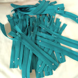 Closed end zips. 15cm long, no.3 size nylon centre fastening and jade green polyester fabric.