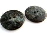 B13936 27mm Black Based 2 Hole Button with a Shimmery Iridescence