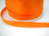 R7026 10mm Orange Satin Ribbon with a Subtle Jacquard Rose Tonal Design