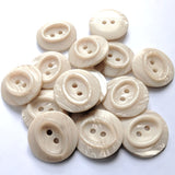 23mm peach satin sheen polyester 2 Hole Button with pearlised shimmery elements and an oval centre.