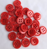 15mm Red 4 hole button. Acrylic with a gloss finish and a raised ringed rim.