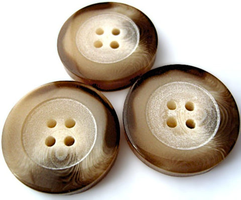 25mm chunky 4 Hole polyester button. Brown tones with creams in the frosted matte centre and a high gloss slightly raised flat rim.