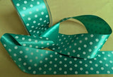 Green satin ribbon with white polka dots