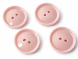 19mm flesh‑pink glossy polyester 2 hole button with smooth rounded face and raised rim.