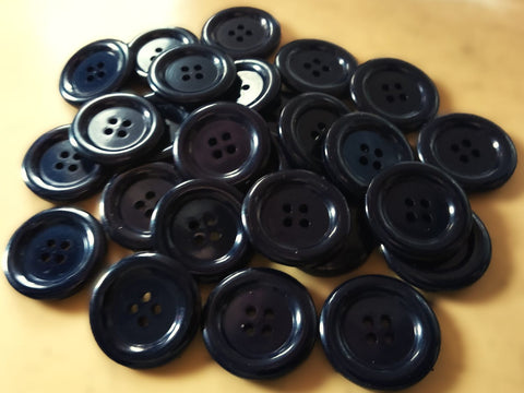 4 hole navy blue coat or cardigan button with a rounded rim