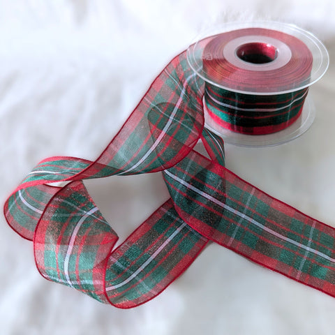 MacGregor Tartan organza ribbon by Berisfords, 40mm wide, shown unrolled to display the sheer red and green tartan pattern.