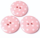 34mm pale pink polyester two hole buttons with white polka dots