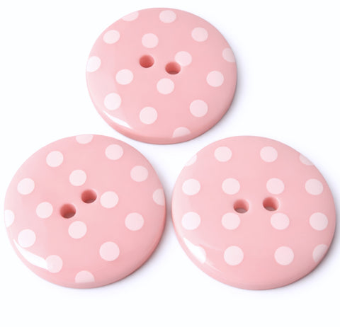 34mm pale pink polyester two hole buttons with white polka dots
