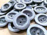 23mm frosted grey glossy 2 hole button. Sold individually, buy the exact quantity of buttons required at Ribbonmoon online haberdashery.