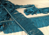 75mm Lampshade and soft furnishing trimming. Teal fringe trim with white in the corded braid. Ribbonmoon trims online shop.