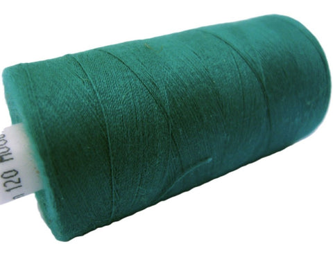 Jade green 67 Coats Moon Spun Polyester Sewing Thread on 1000 yard spool for machine and hand sewing projects.
