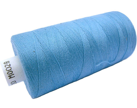 Blue 28 Coats Moon Spun Polyester Sewing Thread on 1000 yard spool for machine and hand sewing projects.