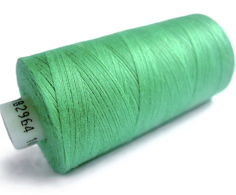 Mint Green 32 Coats Moon Spun Polyester Sewing Thread on 1000 yard spool for machine and hand sewing projects.