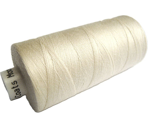 Pale cream 238 Coats Moon Spun Polyester Sewing Thread on 1000 yard spool for machine and hand sewing projects.