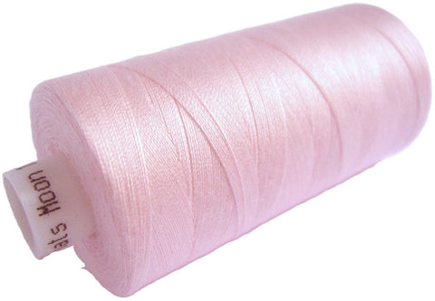 Pale Pink 93 Coats Moon Spun Polyester Sewing Thread on 1000 yard spool for machine and hand sewing projects.