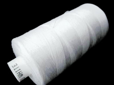 White Coats Moon Spun Polyester Sewing Thread on 1000 yard spool for machine and hand sewing projects.