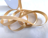 10mm width satin ribbon by Berisfords Ribbons in the UK.  Sold by the metre with discounts for longer lengths and full rolls. Honey gold col.678