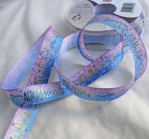Berisfords 15mm Aquarius zodiac sign printed taffeta ribbon in blue, lilac and metallic gold with constellation design