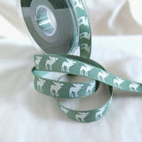 Rustic Scandinavian theme Christmas ribbon. High quality UK made by Berisfords Ribbons. Green and natural white, 1.5cm width. Buy per metre.