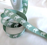 Rustic Scandinavian theme Christmas ribbon. High quality UK made by Berisfords Ribbons. Green and natural white, 1.5cm width. Buy per metre.