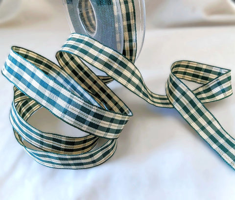 15mm wide green & cream tartan ribbon with this gold metallic stripes. Wire edges & high quality, made by Berisfords Ribbons in the UK. Sold per metre & cut to length with quantity discounts.