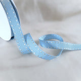 Berisfords 15mm pale blue grosgrain ribbon with satin stitches along the edges