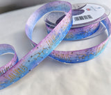 Berisfords Taurus constellation ribbon with metallic gold lettering and starry print, available by the metre or 10m lengths  