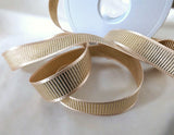 16mm width antique cream satin and metallic gold grosgrain ribbon by Berisfords Ribbons. Extensive range & cheap UK home delivery at Ribbonmoon online. 