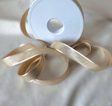 16mm width antique cream satin and metallic gold grosgrain ribbon by Berisfords Ribbons. Extensive range & cheap UK home delivery at Ribbonmoon online. 