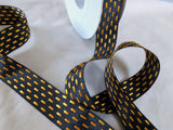 25mm black taffeta ribbon with five marigold satin parallel stitch rows, premium soft‑touch finish, ideal for gift wrapping, décor and craft projects.