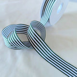 Striped soft touch taffeta ribbon. 2.5cm width, bottle green & white. Berisfords Ribbons, huge online range. Buy per metre with quantity length & full roll discounts. Ribbonmoon UK Shop.