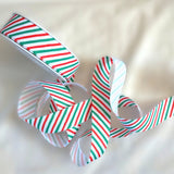 2.5cm wide Christmas candy stripe rustic taffeta ribbon. white, red and green. Sold by the metre and cut to the length required. RIbbonmoon ribbons online UK shop.