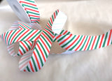 2.5cm wide Christmas candy stripe rustic taffeta ribbon. white, red and green. Sold by the metre and cut to the length required. RIbbonmoon ribbons online UK shop.