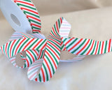 2.5cm wide Christmas candy stripe rustic taffeta ribbon. white, red and green. Sold by the metre and cut to the length required. RIbbonmoon ribbons online UK shop.