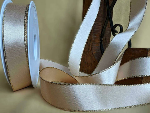 Berisford Ribbons premium quality 25mm cream satin ribbon with metallic gold edges.