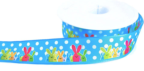 25mm wire edge blue and multi Easter bunny rabbit print taffeta ribbon. 